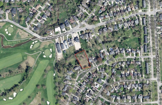 Wide aerial view of 1450 Norfolk Street and the surrounding Birmingham neighborhood